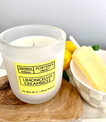 Limoncello Creamsicle 10 oz soy candle.  Clear jar with bright yellow label.  Super summery! 
