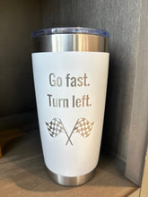 Load image into Gallery viewer, Race tumbler in white that says &quot;Go fast.  Turn left. &quot; with checkered flags underneath. 
