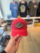 Load image into Gallery viewer, Indianapolis Motor Speedway Wing and Wheel Beach Wash Trucker Hat by Justin Patten (5 Colors)
