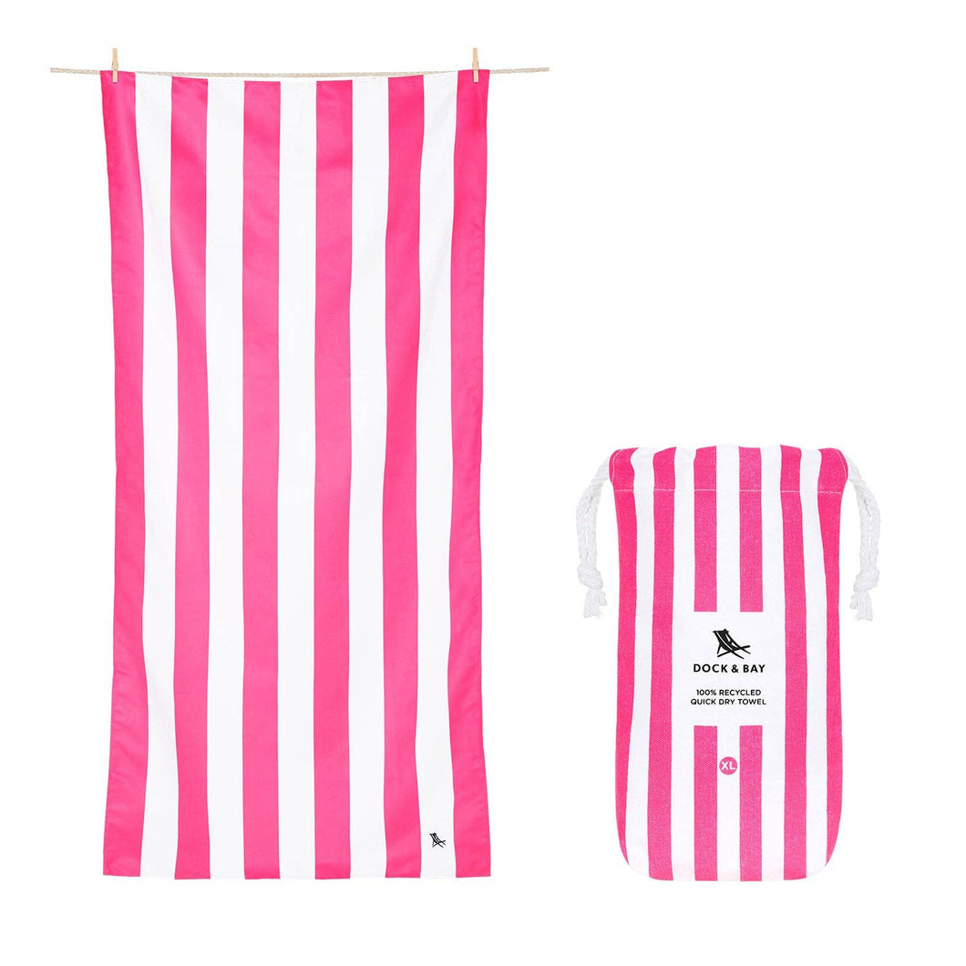 Dock & Bay Extra Large Quick Dry Towel in the color Phi Phi Pink.  It is dark pink and white striped and has a carrying pouch in the same design, which is shown.  