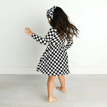 Load image into Gallery viewer, Shows little girl with checkered dress and checkered hair bow in hair. 
