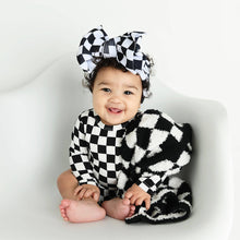 Load image into Gallery viewer, Shows baby with checkered tutu bodysuit, checkered headband, and checkered baby blanket.  
