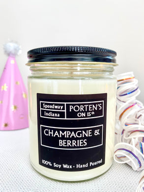 Champagne & berries candle 100%soy wax in a clear jar with black lid and label