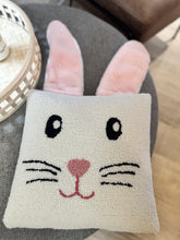 Load image into Gallery viewer, Handcrafted throw pillow featuring 3D bunny ears made from 100% wool using traditional hooked techniques. Backed in luxurious 100% polyester velvet with a convenient zipper closure. Measures 14&quot; x 14&quot;. Perfect for adding a touch of whimsy to any room.
