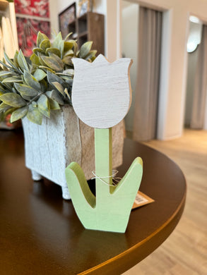 White wooden tulip cutout with textured center and green stem (3.25
