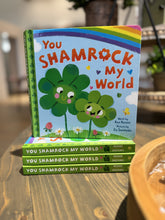 Load image into Gallery viewer, You shamrock my world board book for toddlers with bright colors and a perfect way to bond with your little leprechaun. 
