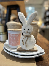 Load image into Gallery viewer, White plush Easter bunny with floppy ears, sitting on a rustic wood block stand. 9 inches tall.
