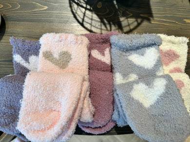 Fuzzy socks with hearts on them.  Come in 5 colors--grey, pink, mauve, ivory, and yam.