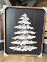 Load image into Gallery viewer, Wooden sign with a black background and white snowy pine tree in center.  Comes in two sizes to fit any space. 
