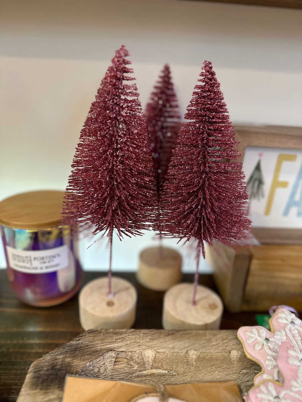Wine colored wire glitter trees on base.  Choose from 3 sizes. 