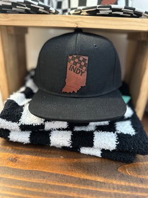Indy Racing hat for baby.  Black with leather patch in the shape of Indiana with INDY and checkered design at top. 