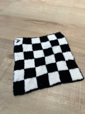 Black and white checkered baby lovey.  Has a hole in one corner to attach pacifier.  Soft and cuddley.  9x9
