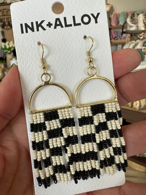 Checkered beaded fringe earrings by Ink & Alloy.  Gold hardware. 