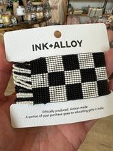 Load image into Gallery viewer, Chunky black and white checkered beaded bracelet.  Checkered pattern is on top only.  By Ink &amp; Alloy. 
