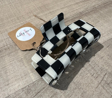 Black and white checkered claw clip. 