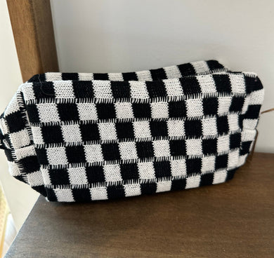 Checkered cosmetic bag. 