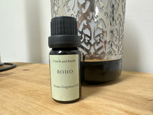 Load image into Gallery viewer, BOHO  home fragrance oil has scents of pistachio, vanilla, salted caramel and is infused with notes of almond, jasmine and sandalwood.
