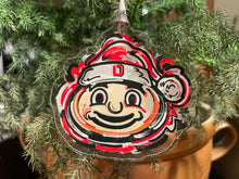 Load image into Gallery viewer, The Ohio State University Santa Hat Brutus Ornament by Justin Patten
