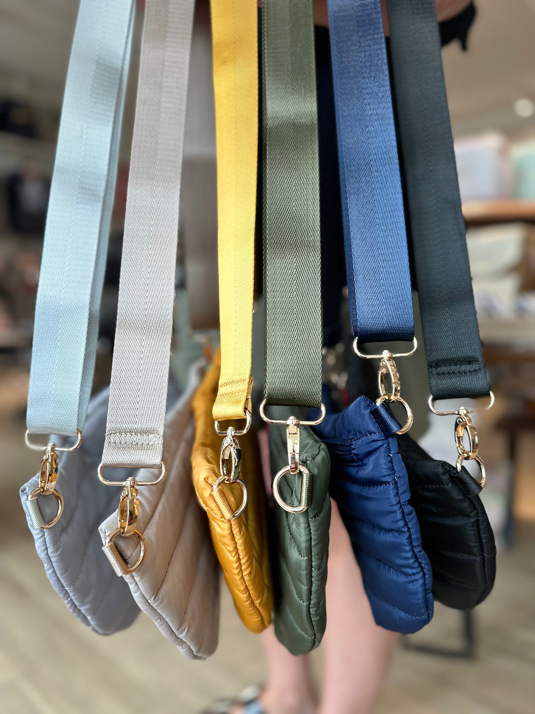 Puffer belt bag with adjustable strap.  Choose your color: light grey, sand, sunflower yellow, olive, navy, and black. 