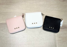 Load image into Gallery viewer, Wanderer travel pouch shown in pink, cream, and black. 
