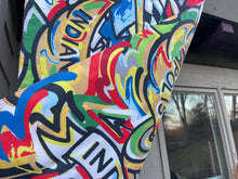 Load image into Gallery viewer, Indianapolis Motor Speedway Motion Wing and Wheel House Flag  by Justin Patten (New 2025 Design)(29&quot;x43&quot;)
