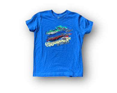 Indy 500 youth tee in bright blue.  Has flyover planes and the colors of the race flags with the words Indy 500 underneath.  