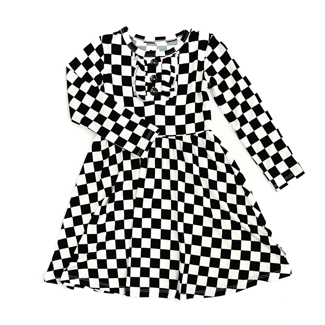 Black and white checkered dress with a white background. 