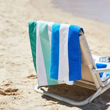 Load image into Gallery viewer, Quick Dry Towel shown in the color Endless River on the back of a beach chair. 
