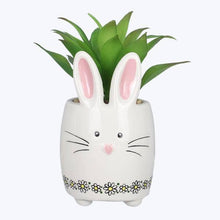 Load image into Gallery viewer, White ceramic bunny planter with a green succulent inside.
