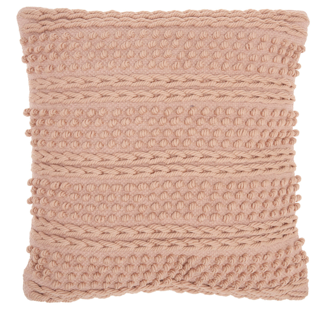 Soft and inviting blush throw pillow adds a touch of texture to your decor.