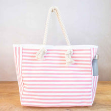 Load image into Gallery viewer, Beach tote bag in melon and white horizontal stripes with rope straps.  Has a magnetic closure. 15X14X6
