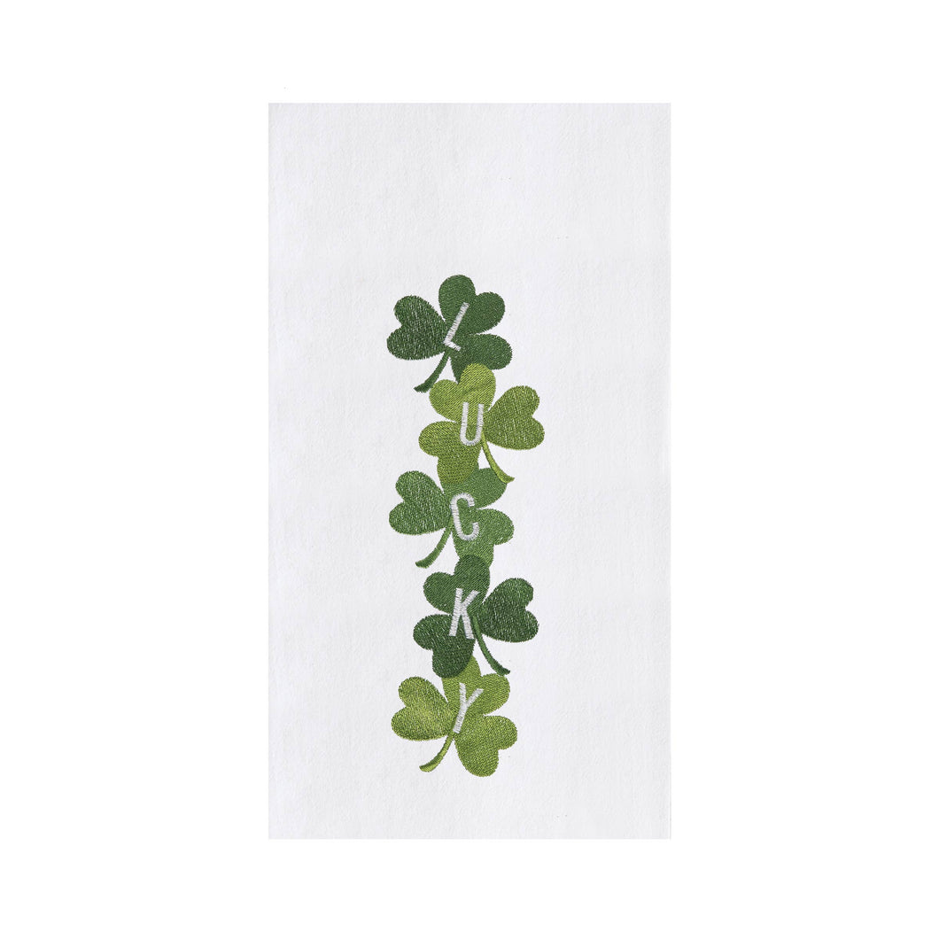 White St. Patrick's Day kitchen towel embroidered with shamrocks in vibrant shades of green with the white letters spelling 