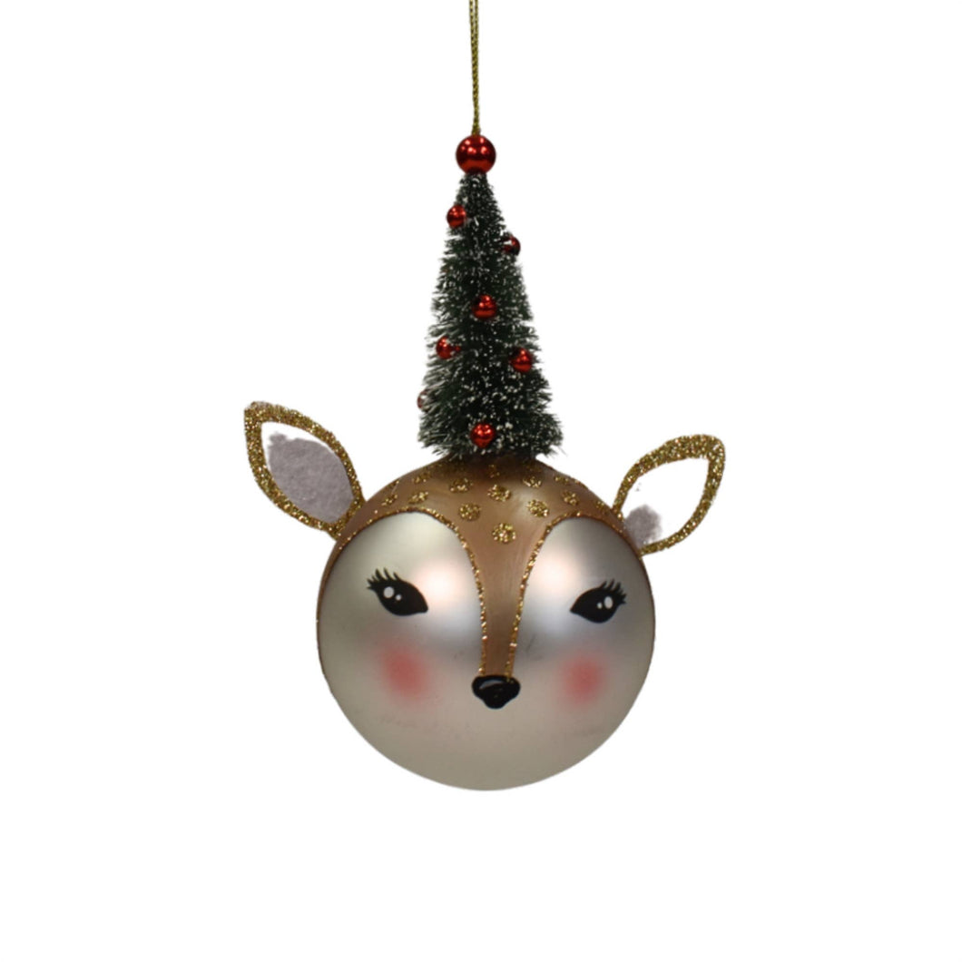 glass ball painted like a deer's face with Christmas tree on top 