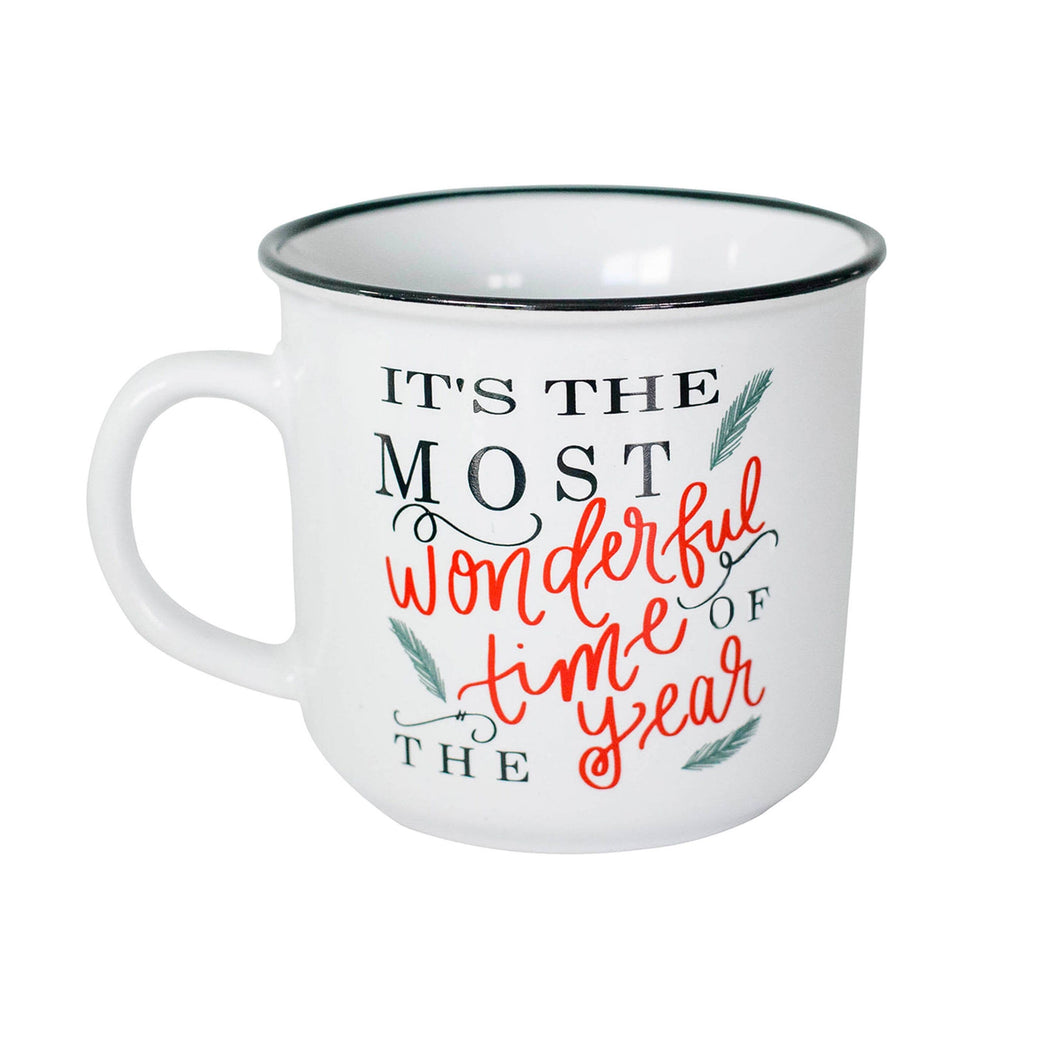 white coffee mug with red and green lettering 
