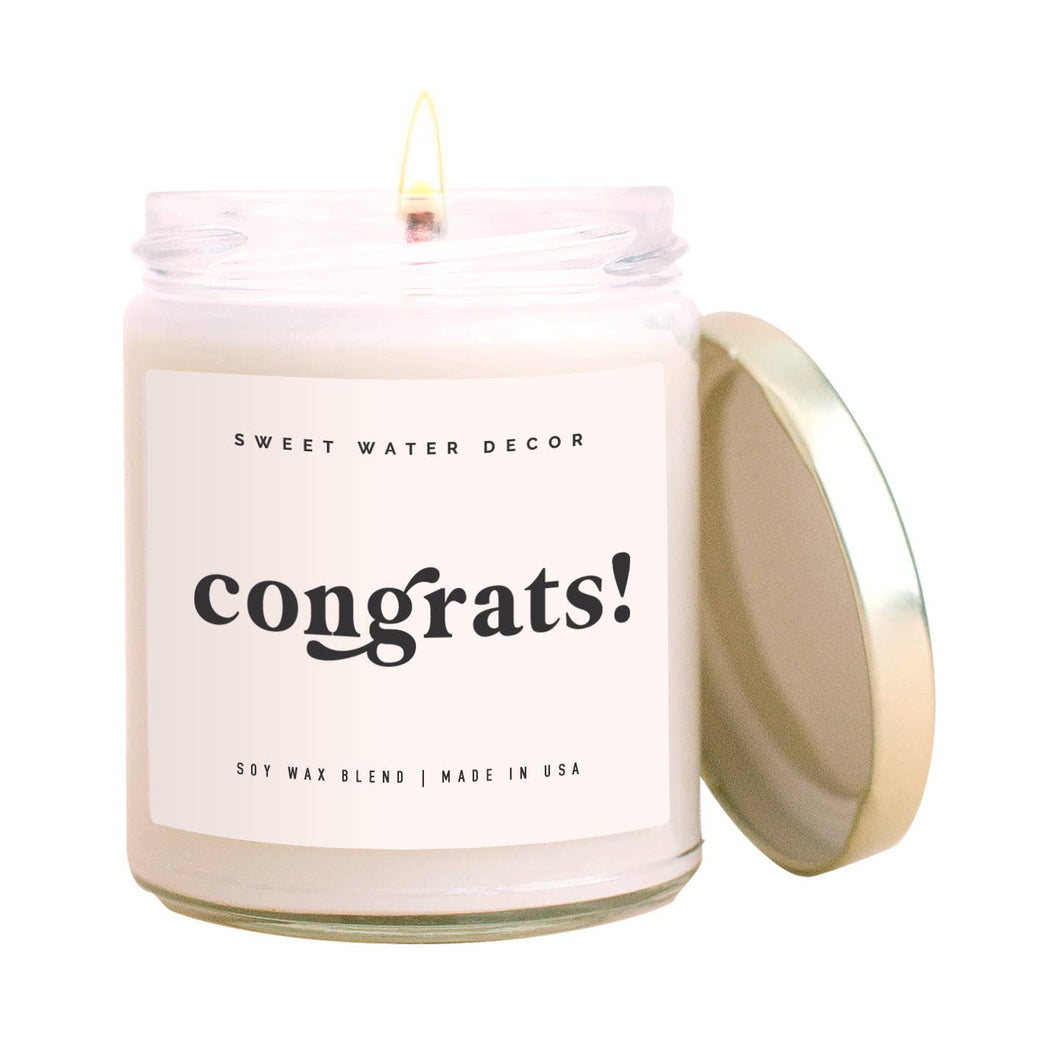 congrats candle, clear jar with white candle and lable with congrats! in black on front