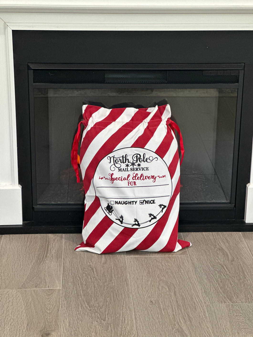 Red and white striped Santa sack with 