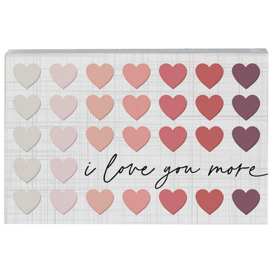 Small, white, rectangular sign with gradient hearts and the words 
