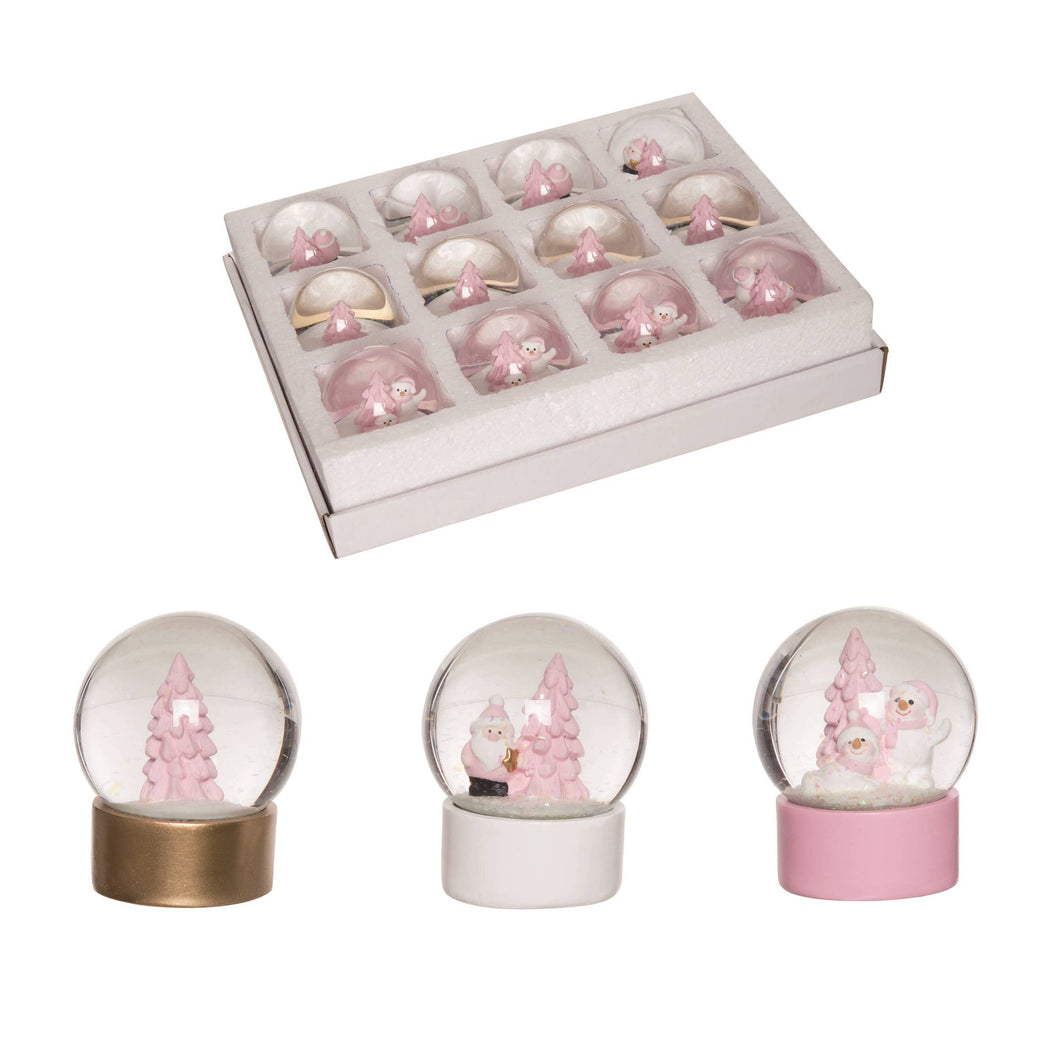 All 3 styles of the mini pastel Christmas snowglobe, pink, gold, and white bases