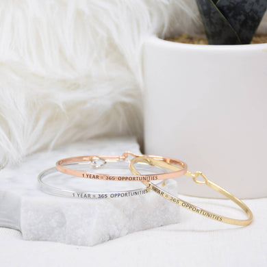 Find your perfect mantra! Delicate bracelets in gleaming gold, soft rose gold, or classic silver, inscribed with inspirational messages.
