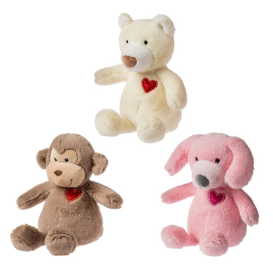 Small plush stuffed monkey in brown, dog in pink, and bear in cream.  All have a red heart sewn on the front left chest. 
