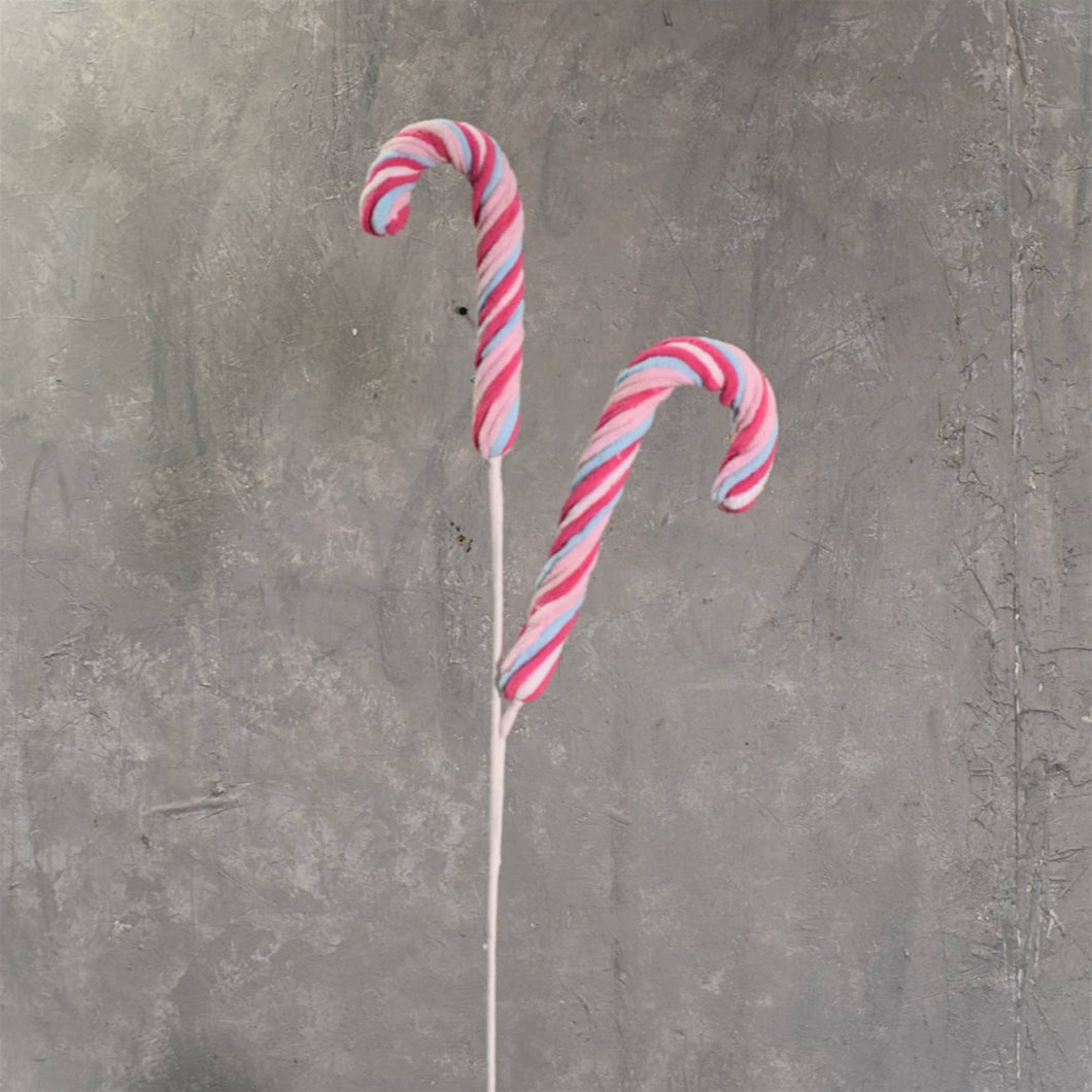 2 chenille candy canes on a bendable stick in blue, pink, and white. 