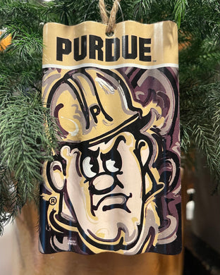 Purdue Pete metal Ornament with PURDUE in black letters across the top 
