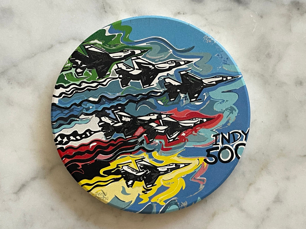 Indy 500 stone coaster featuring Justin Patten's Flyover design.  6 flyover planes with the race flag colors and Indy 500 painted on a blue background. 