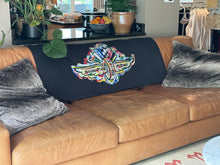 Load image into Gallery viewer, Indianapolis Motor Speedway black fleece blanket, view on back of couch
