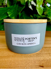 Load image into Gallery viewer, God Bless America candle in a light blue jar with wooden lid.  10oz. 
