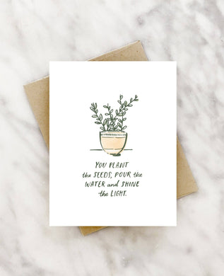 Card reads: You plant the seeds, pour the water, and shine the light