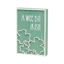 Load image into Gallery viewer, &quot;A Wee Bit Irish&quot; laser-cut wooden sign with green background, white text, and border. Home décor for Irish heritage enthusiasts. Measures 4&quot; x 6&quot; x 1&quot;.
