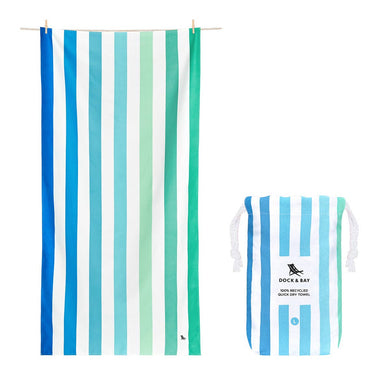 Dock & Bay Extra Large Quick Dry Towel (78X35) in the color Endless River.  It is striped white and various shades of greens and blues.  Also shown is a pouch to carry it in in the same design as the towel. 