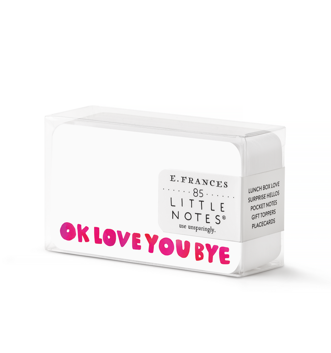 Small clear box with 85 small notecards inside.  They are white and the front says okloveyoubye in pink and the back has a pink smiley face on it. 