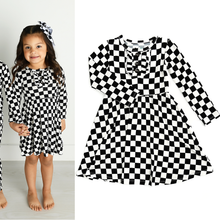Load image into Gallery viewer, Checkered tutu dress alone and on a little girl.  Long sleeve with ruffle around 3 buttons on top.  
